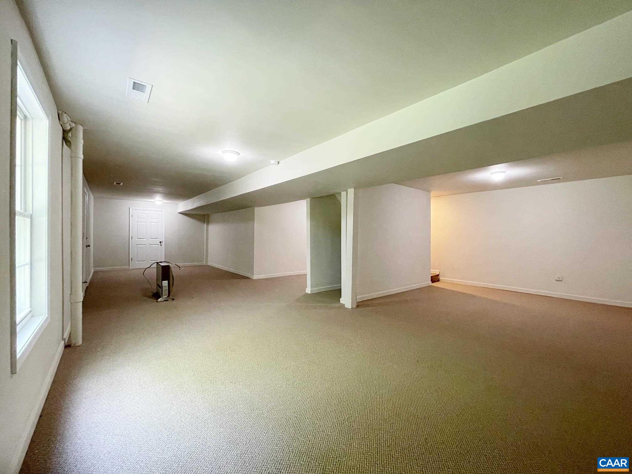 81 Phlox Road Ruckersville, VA 22968 - Photo 18 of 24 a view of a livingroom and a fireplace