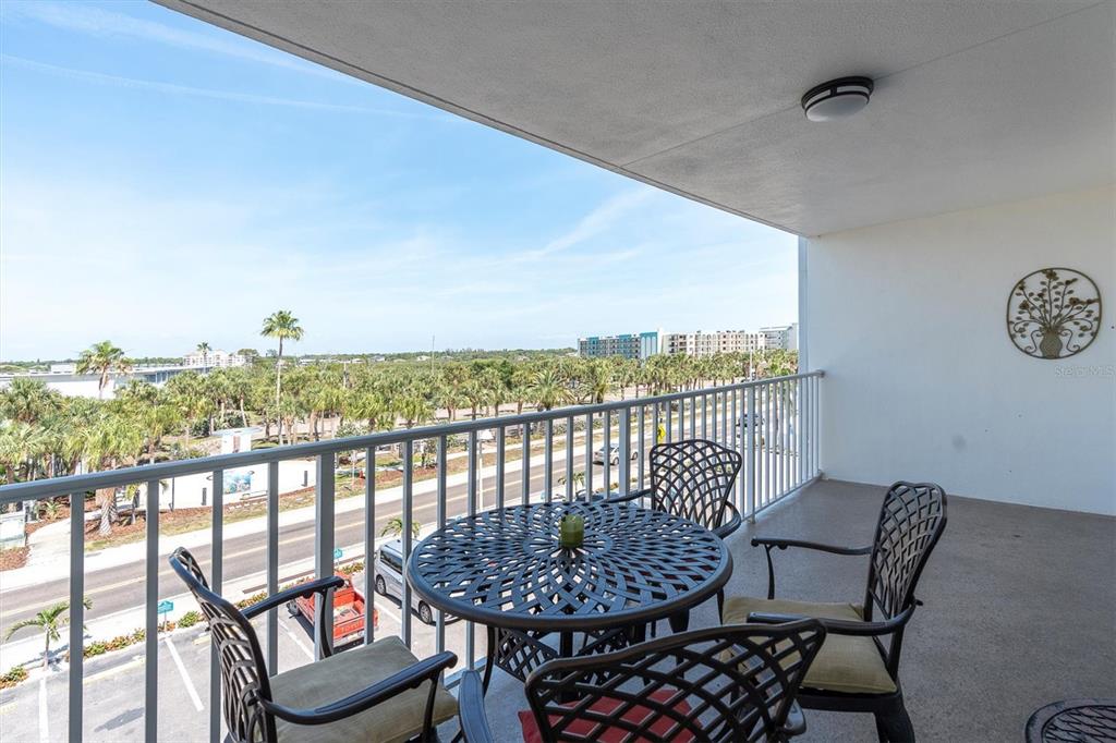 19610 Gulf Boulevard, Unit 308 Indian Rocks Beach, FL 33785 - Photo 24 of 41 a view of a balcony with furniture