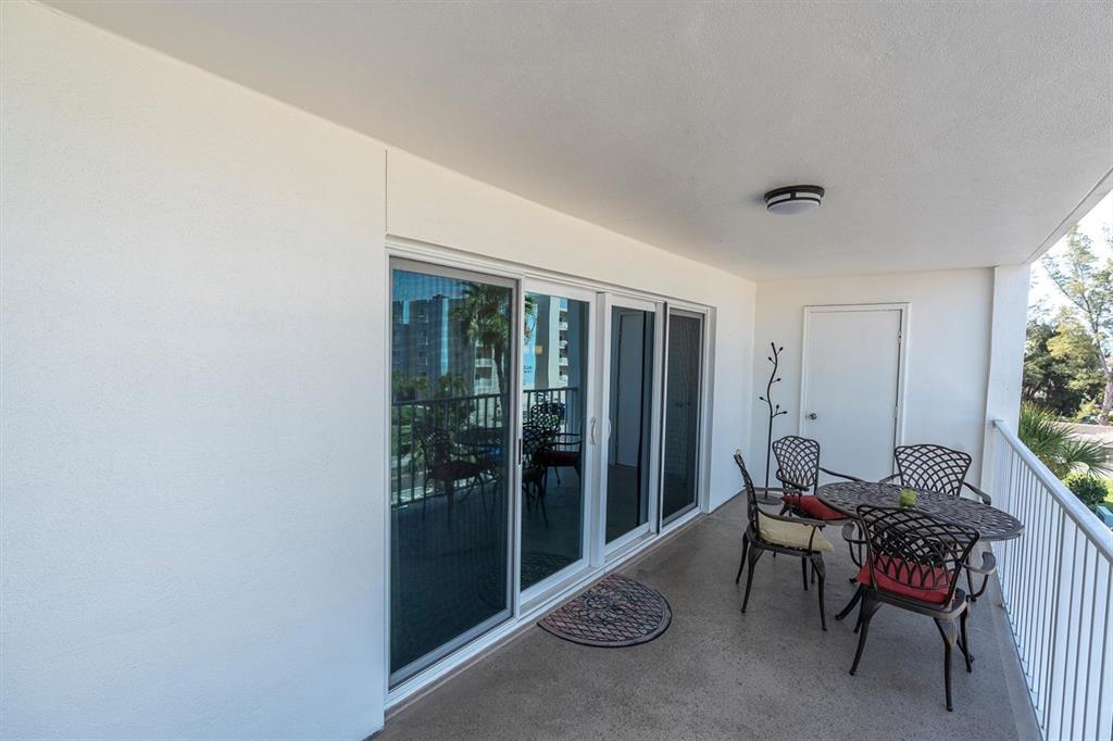 19610 Gulf Boulevard, Unit 308 Indian Rocks Beach, FL 33785 - Photo 25 of 41 a living room with furniture and a window