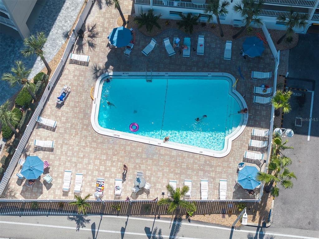 19610 Gulf Boulevard, Unit 308 Indian Rocks Beach, FL 33785 - Photo 30 of 41 an aerial view of a house with a yard