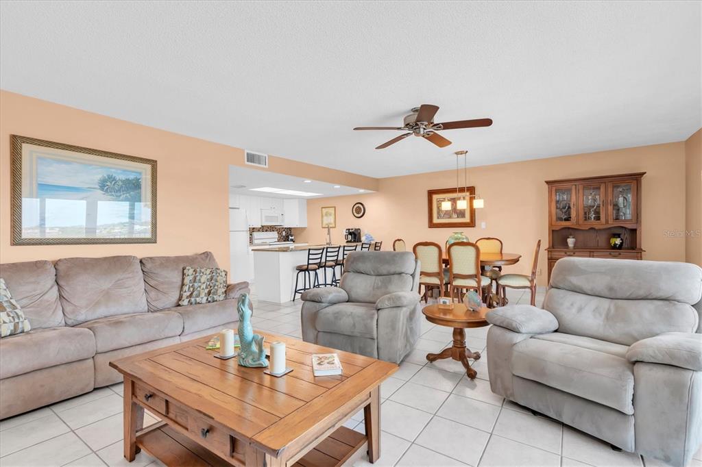 19610 Gulf Boulevard, Unit 308 Indian Rocks Beach, FL 33785 - Photo 8 of 41 a living room with furniture kitchen view and a window