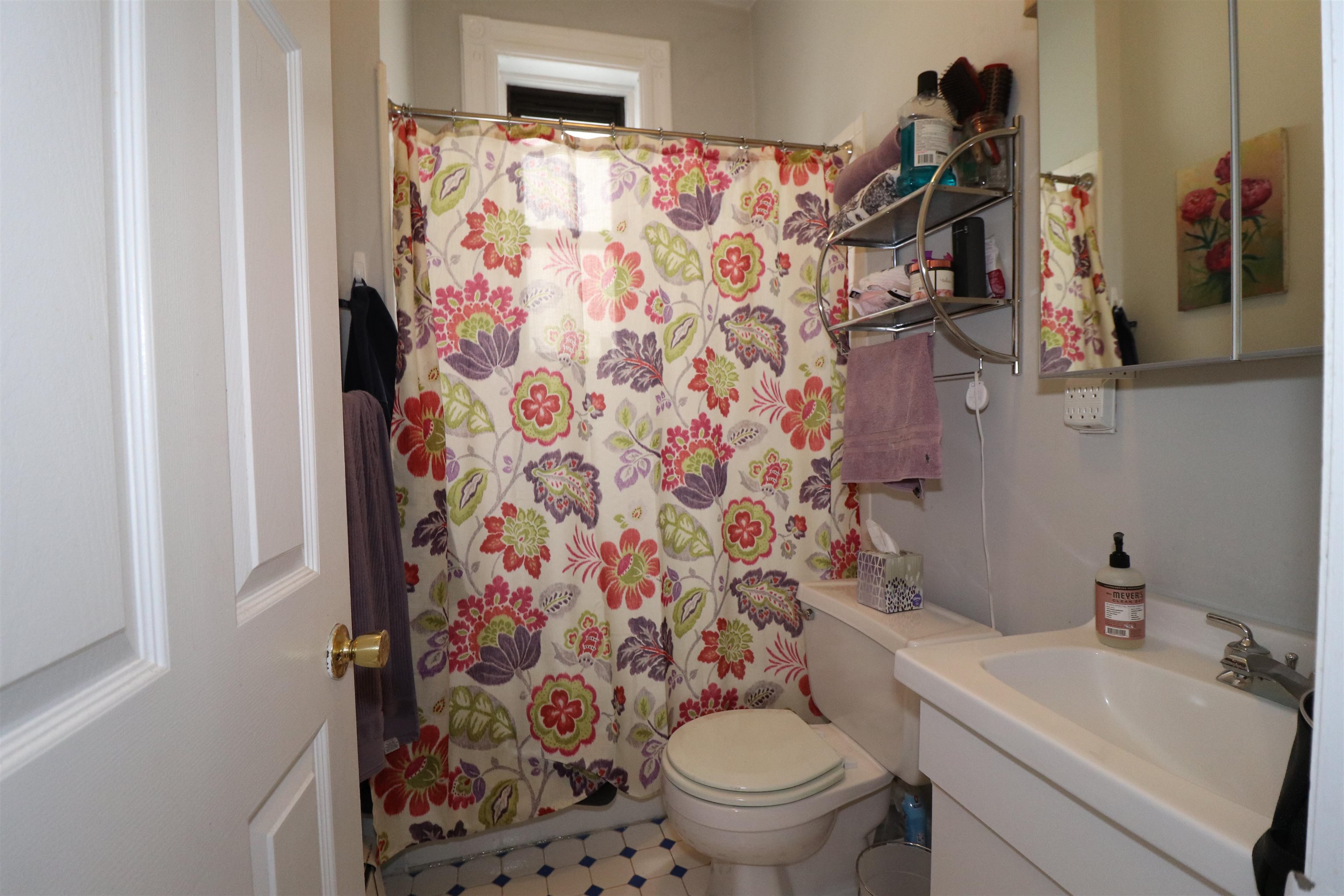 308 8th Street, Unit 2 Hoboken, NJ 07030 - Photo 5 of 8 a white toilet sitting next to a bathroom sink