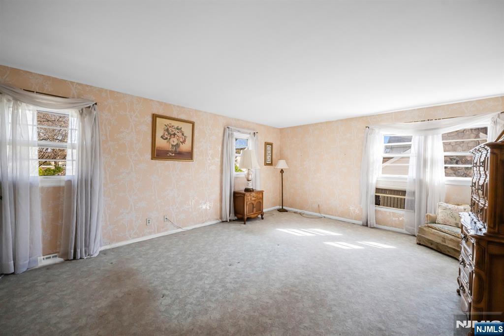 204 Tryon Place Paramus, NJ 07652 - Photo 13 of 33 an empty room with furniture and a window