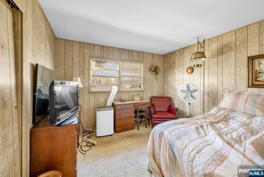204 Tryon Place Paramus, NJ 07652 - Photo 17 of 33 a bedroom with a bed and furniture