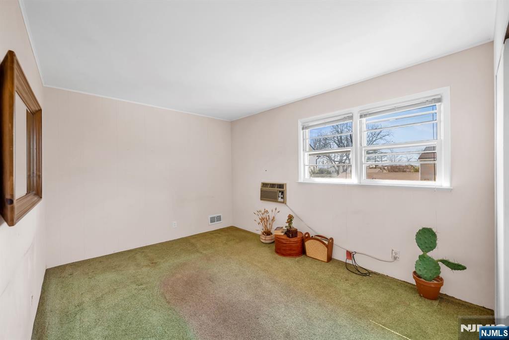 204 Tryon Place Paramus, NJ 07652 - Photo 22 of 33 a view of a room with window and wooden floor