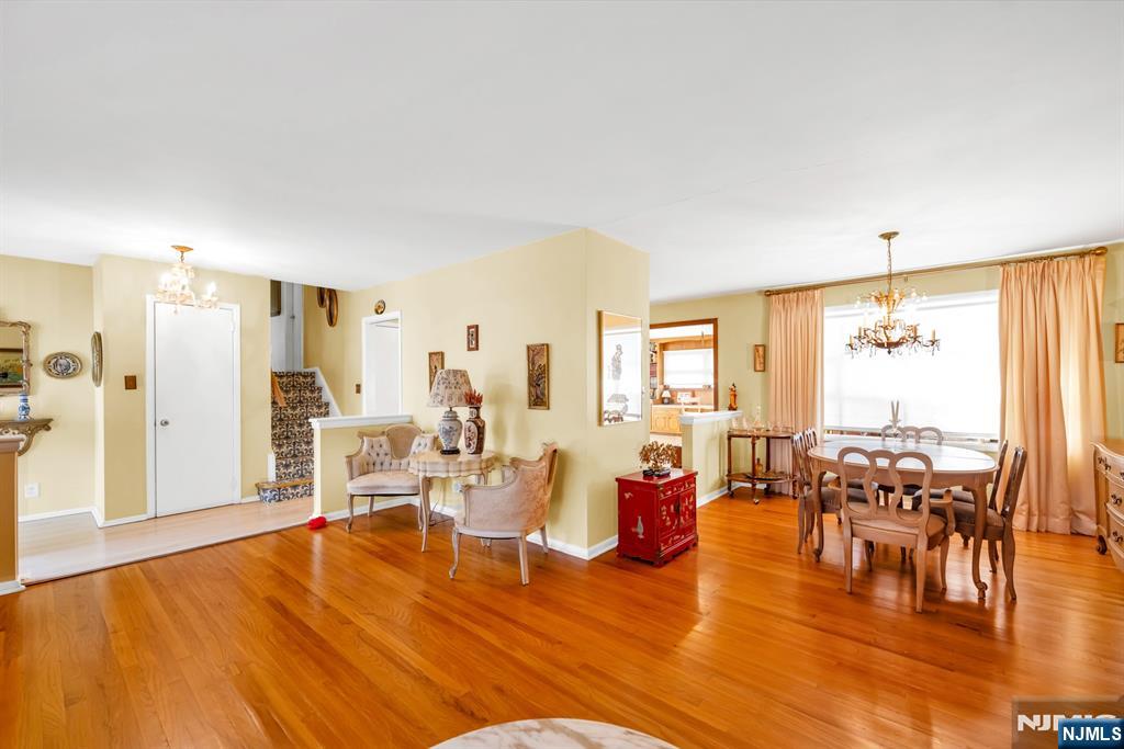 204 Tryon Place Paramus, NJ 07652 - Photo 3 of 33 a living room with furniture and wooden floor