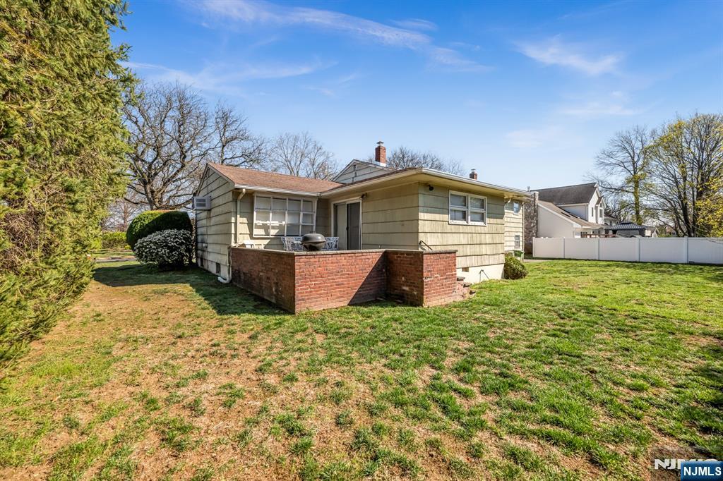 204 Tryon Place Paramus, NJ 07652 - Photo 31 of 33 a house view with a garden space