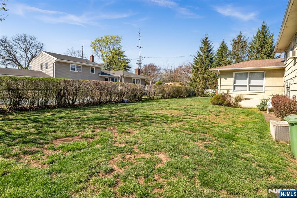 204 Tryon Place Paramus, NJ 07652 - Photo 32 of 33 a view of a house with a yard