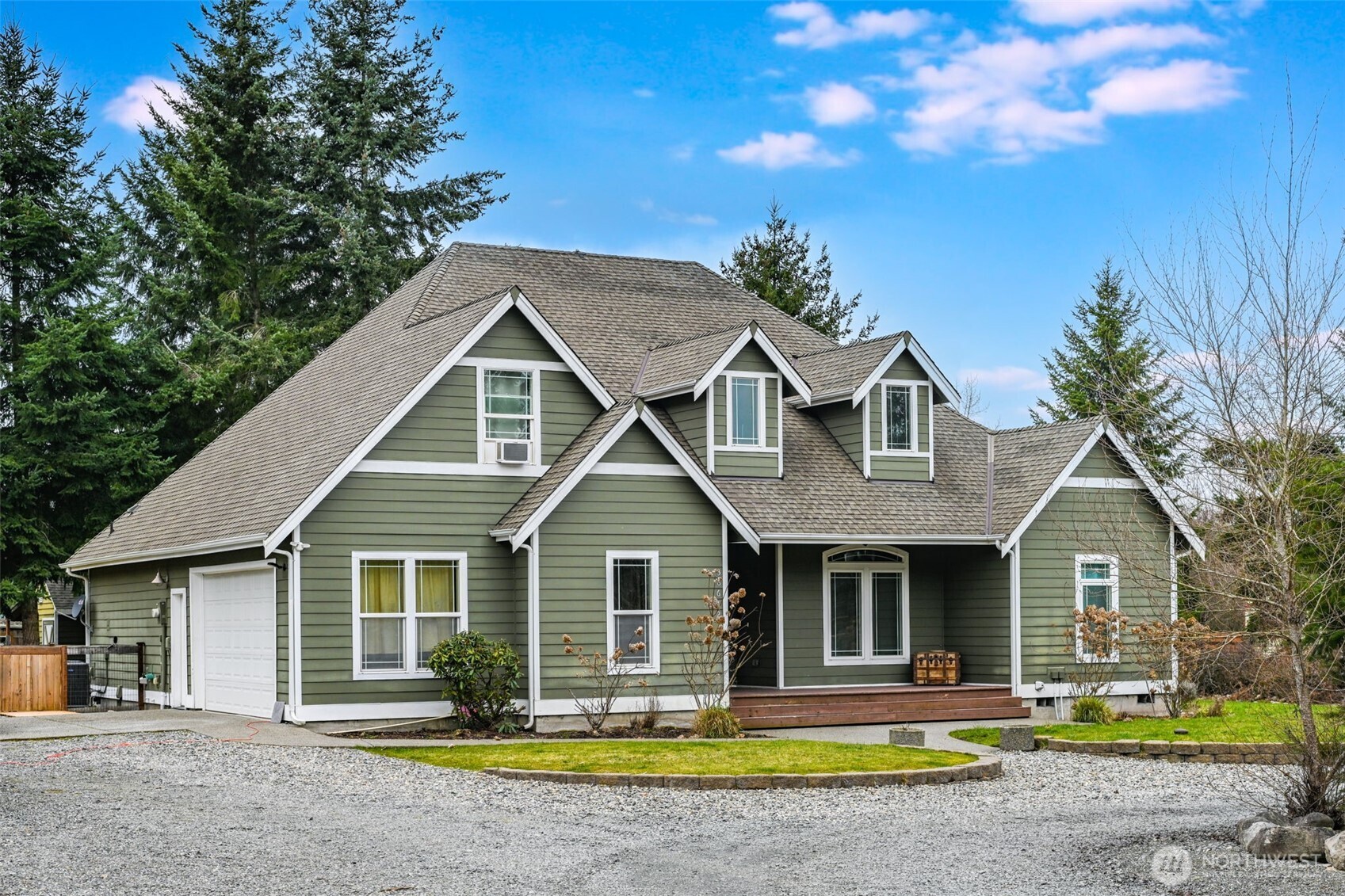 36612 2nd Avenue South Roy, WA 98580 - Photo 2 of 40 a front view of a house with garden