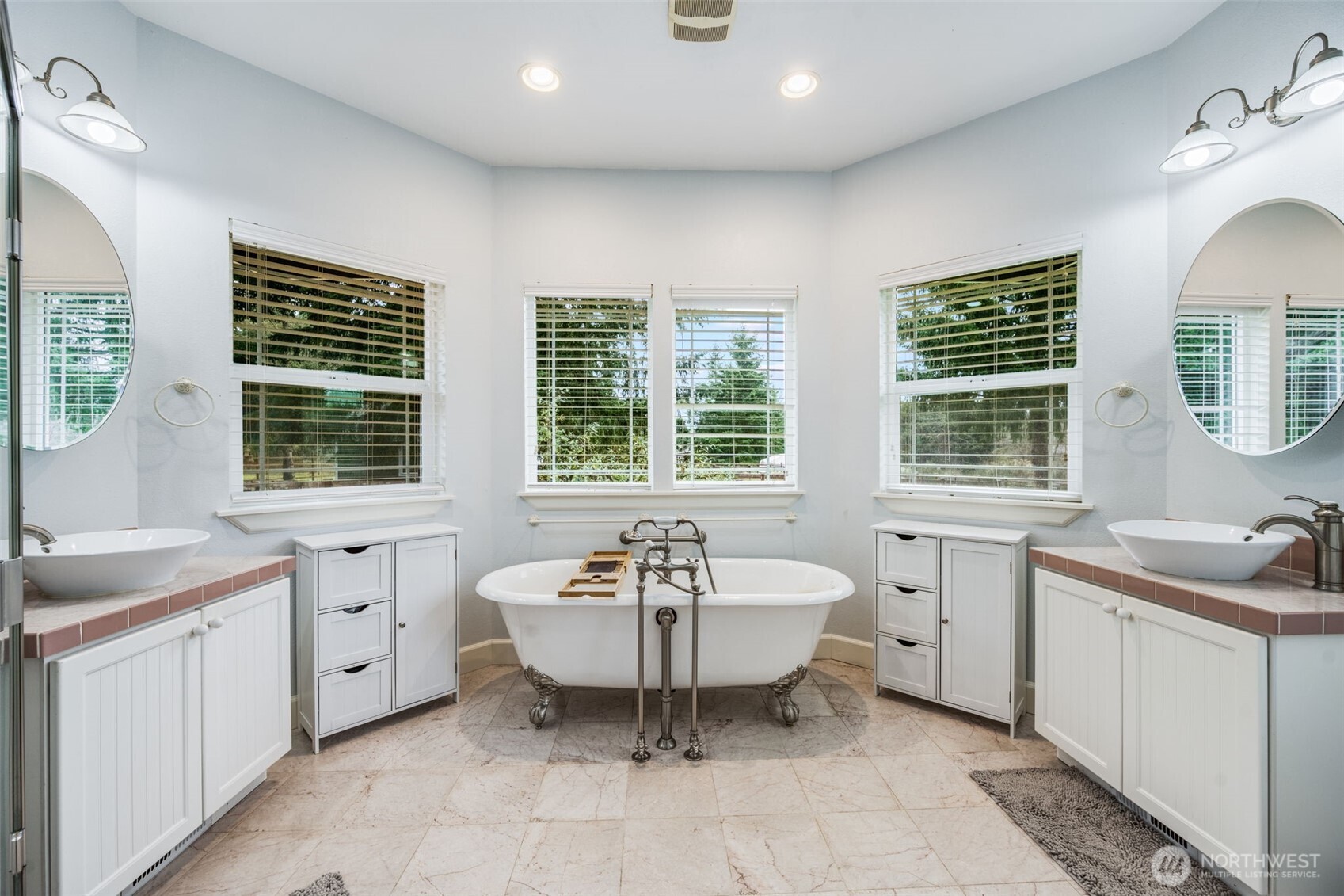36612 2nd Avenue South Roy, WA 98580 - Photo 25 of 40 a spacious bathroom with a double vanity sink large mirror and a bathtub