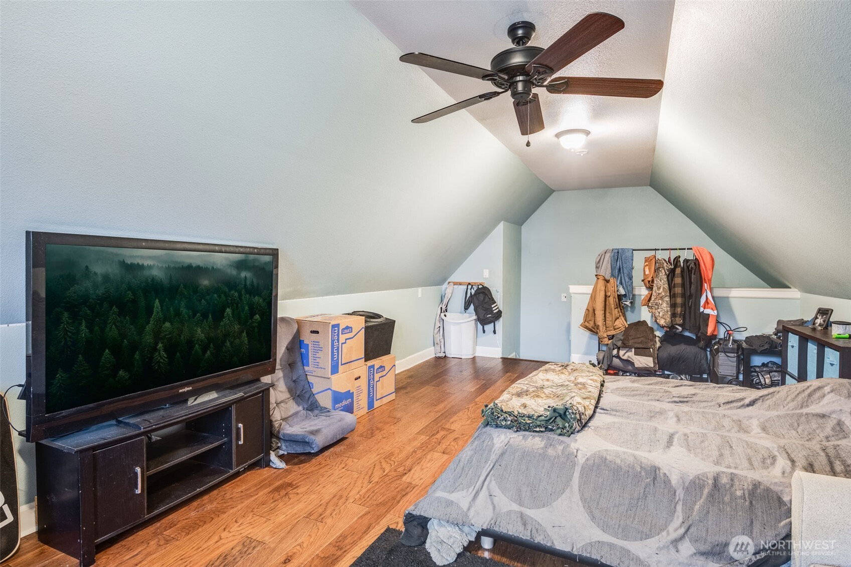 36612 2nd Avenue South Roy, WA 98580 - Photo 31 of 40 a living room with furniture and a flat screen tv