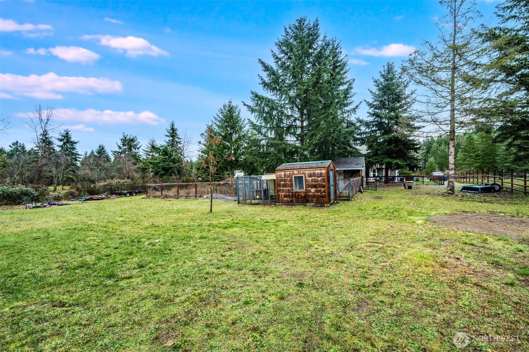 36612 2nd Avenue South Roy, WA 98580 - Photo 36 of 40 a backyard of a house with table and chairs