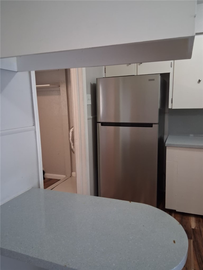 2333 Riggan Street Corpus Christi, TX 78404 - Photo 8 of 12 a refrigerator freezer sitting in a kitchen