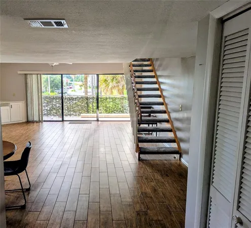 a view of entryway with wooden floor