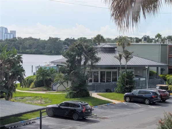 a view of a car parked in front of a house