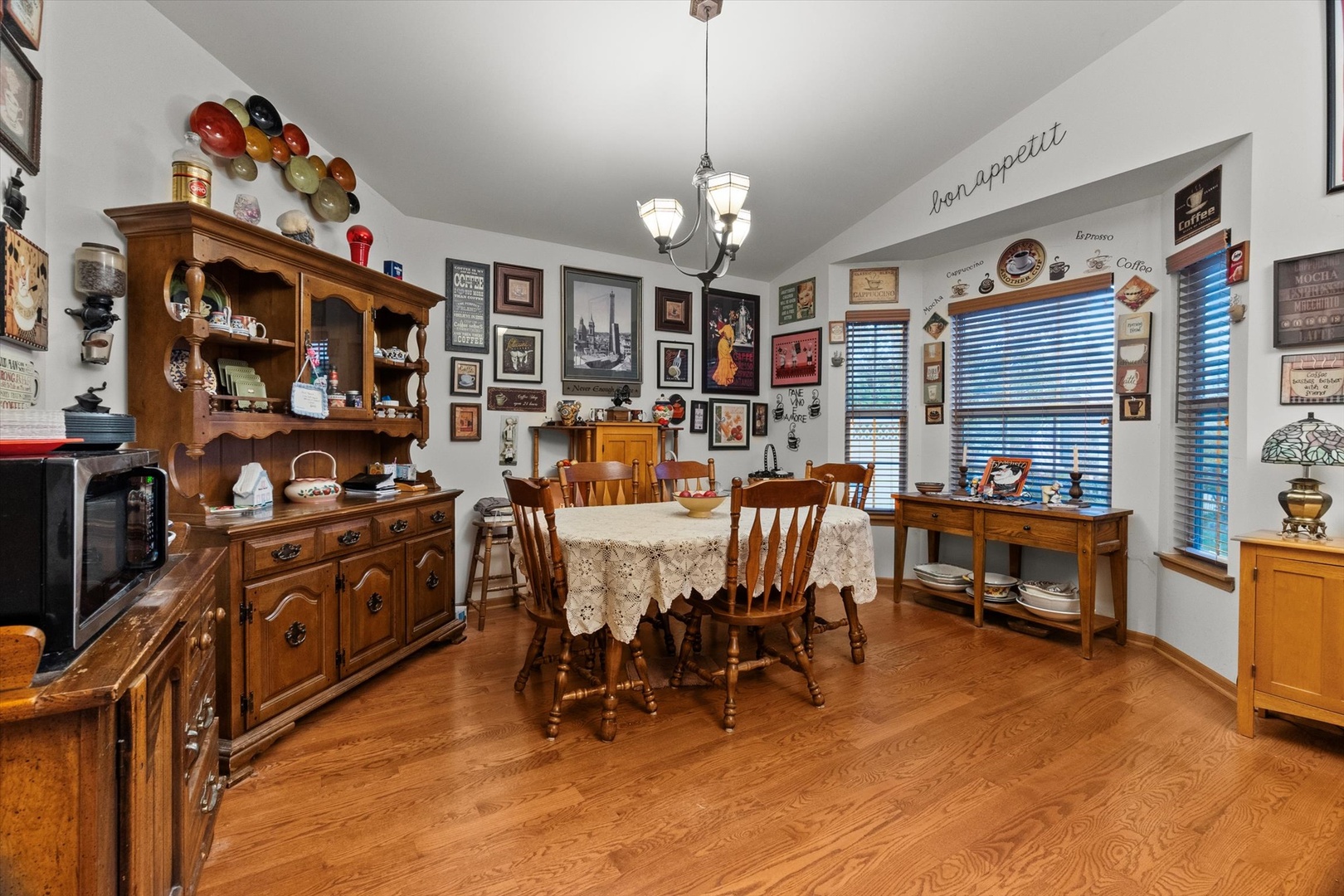 25426 Barrow Road Manhattan, IL 60442 - Photo 10 of 30 a view of a dining room with furniture window and wooden floor