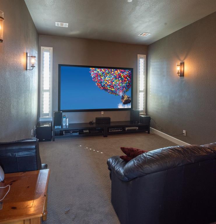 1755 Heifner Road Lucas, TX 75002 - Photo 18 of 35 a bed room with a bed and a television