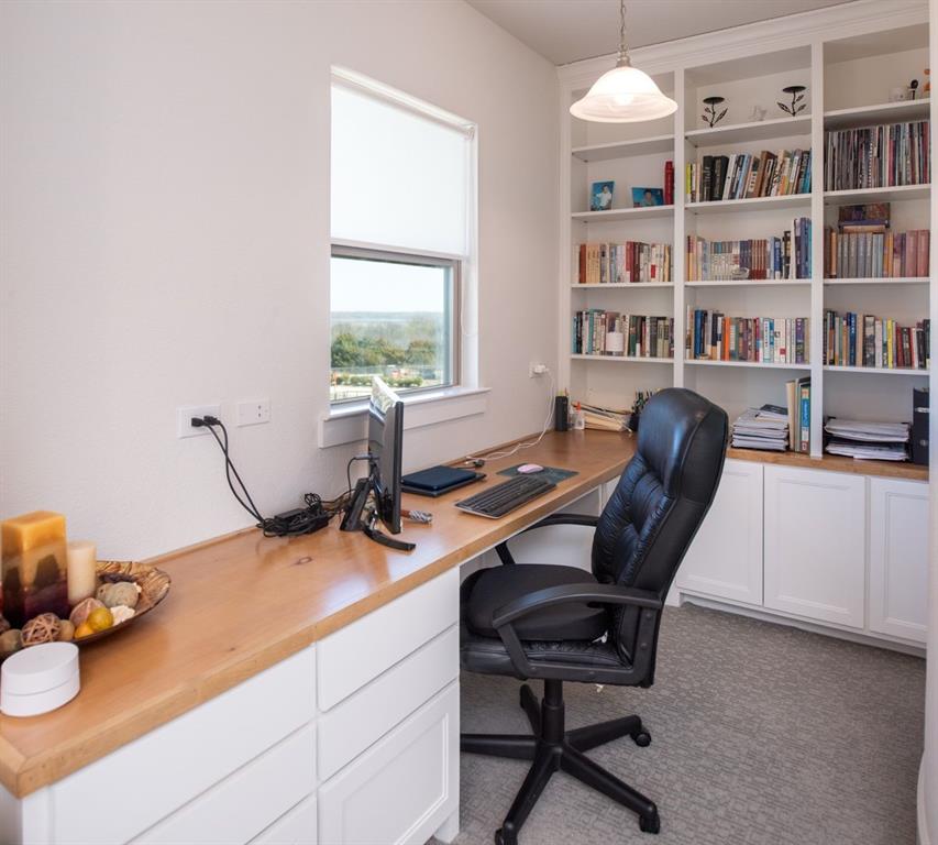 1755 Heifner Road Lucas, TX 75002 - Photo 26 of 35 a view of a workspace with furniture and a window