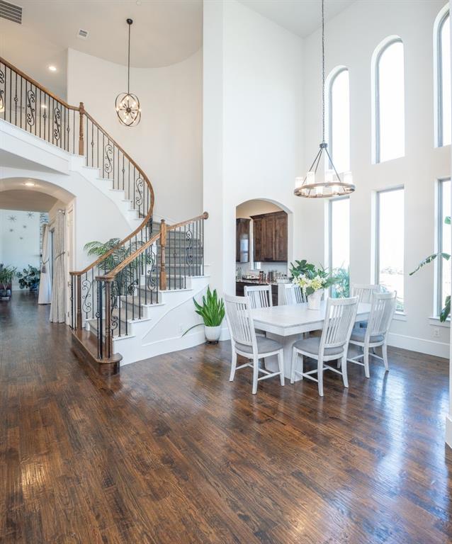 1755 Heifner Road Lucas, TX 75002 - Photo 3 of 35 a view of a dining room with furniture window and wooden floor