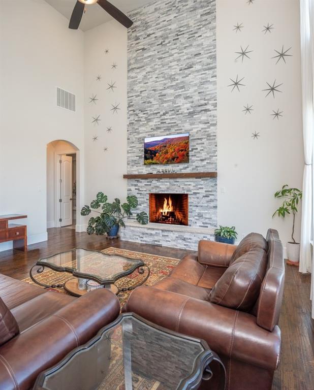 1755 Heifner Road Lucas, TX 75002 - Photo 7 of 35 a living room with furniture and a fireplace