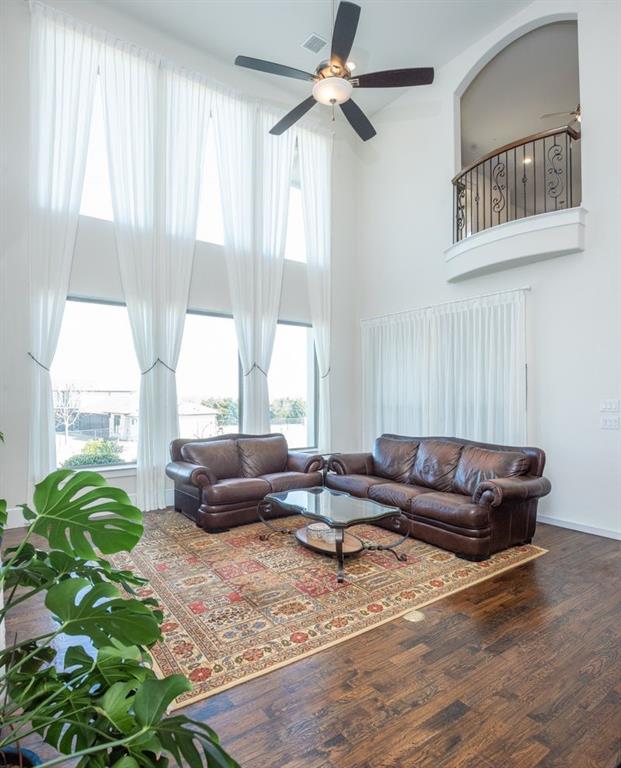 1755 Heifner Road Lucas, TX 75002 - Photo 10 of 35 a living room with furniture and a large window