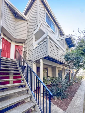 a front view of building with yard