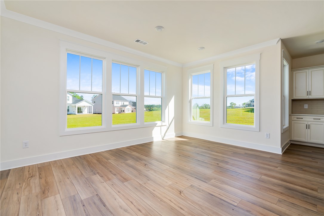 134 Ridgeline Row Central, SC 29630 - Photo 20 of 47 This bright, airy living space features hardwood floors and abundant natural light.