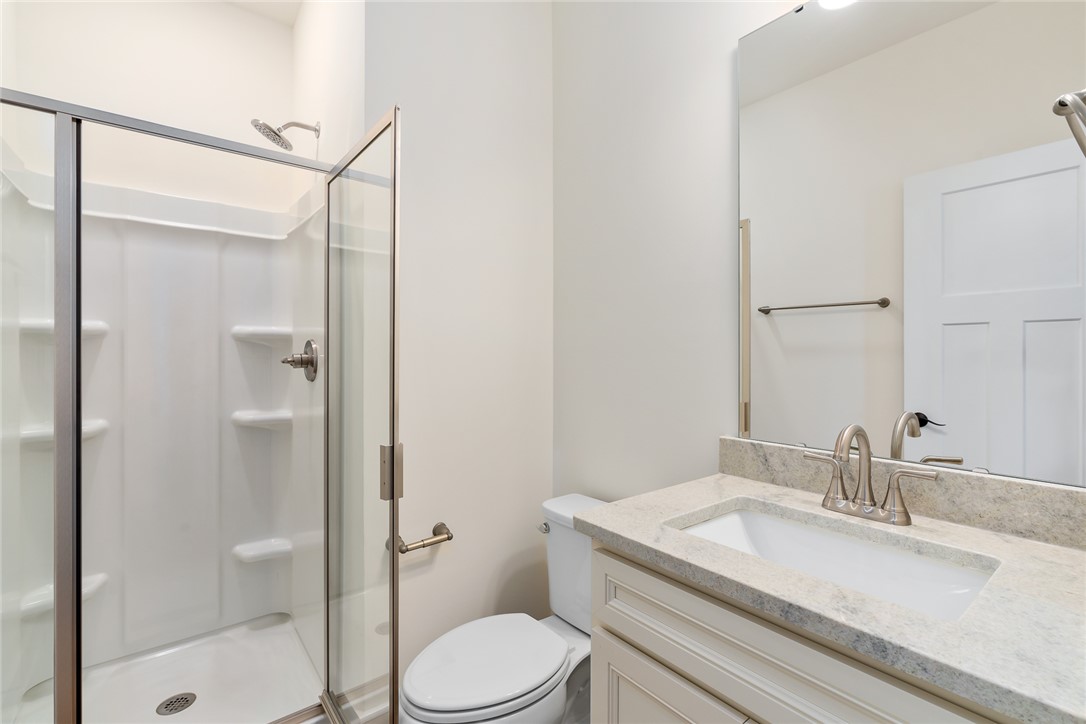 134 Ridgeline Row Central, SC 29630 - Photo 21 of 47 This bright bathroom features a convenient shower and a sleek vanity with ample counter space.