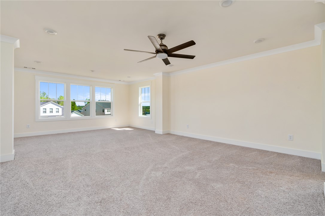 134 Ridgeline Row Central, SC 29630 - Photo 26 of 47 This spacious room offers comfort and ample natural light, creating an inviting atmosphere.