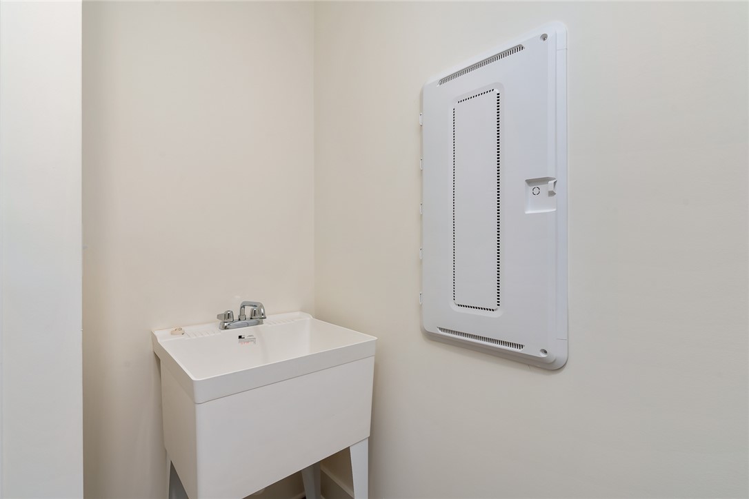 134 Ridgeline Row Central, SC 29630 - Photo 40 of 47 This dedicated utility room offers convenient amenities for household tasks.