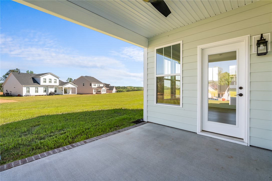 134 Ridgeline Row Central, SC 29630 - Photo 41 of 47 This tranquil outdoor space offers a peaceful escape with sweeping views of the surrounding green landscape.