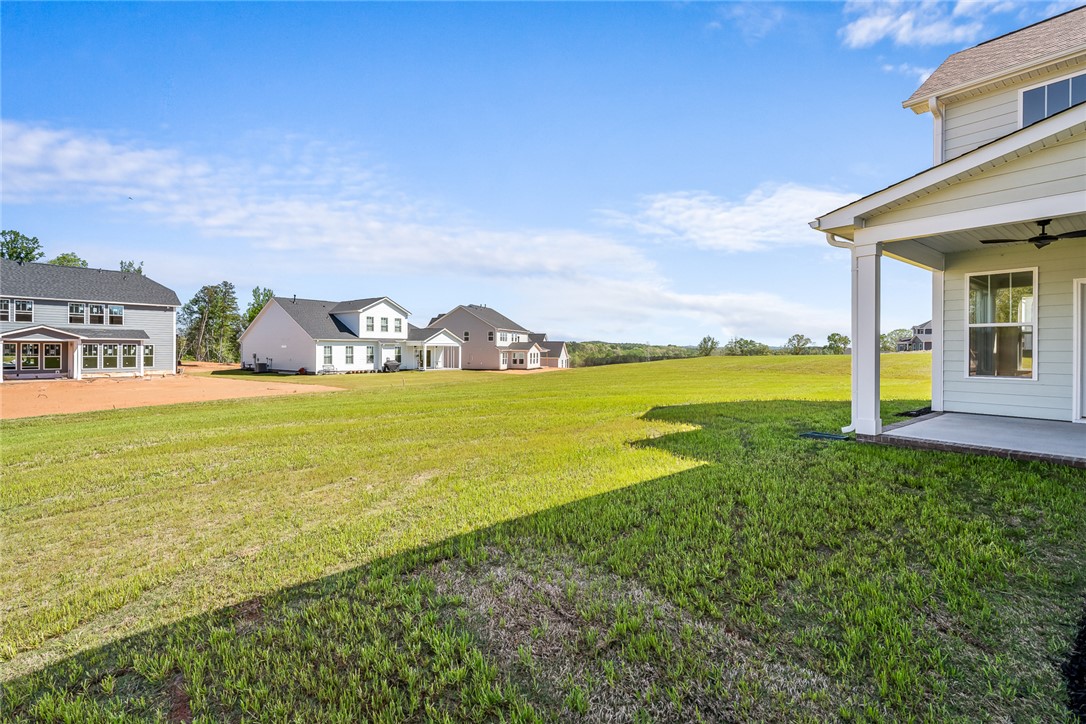 134 Ridgeline Row Central, SC 29630 - Photo 43 of 47 This new construction offers expansive green space, perfect for outdoor living and community enjoyment.