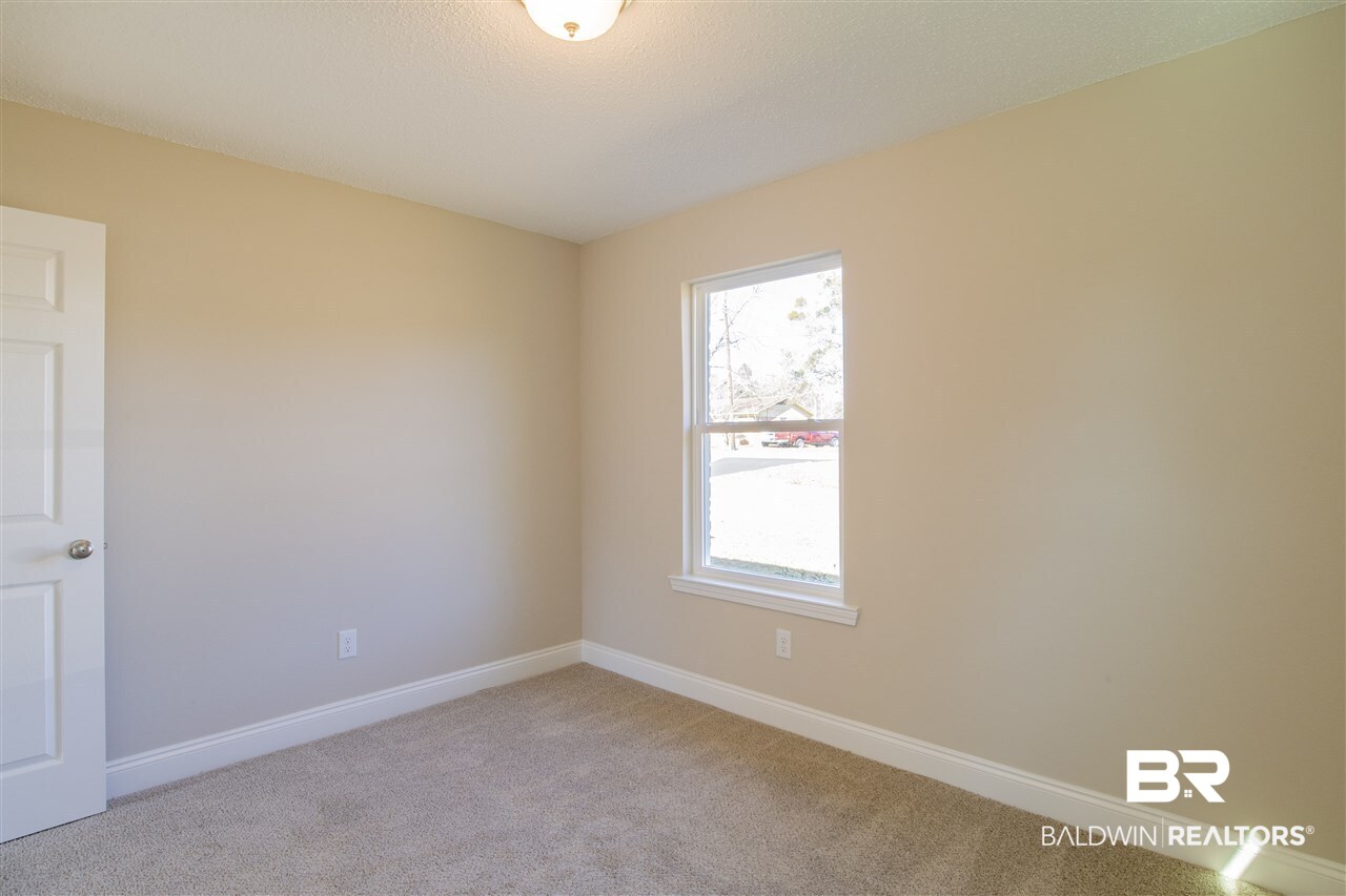9141 Semmes Court Semmes, AL 36575 - Photo 19 of 28 Guest bedrooms have nice sized closets.