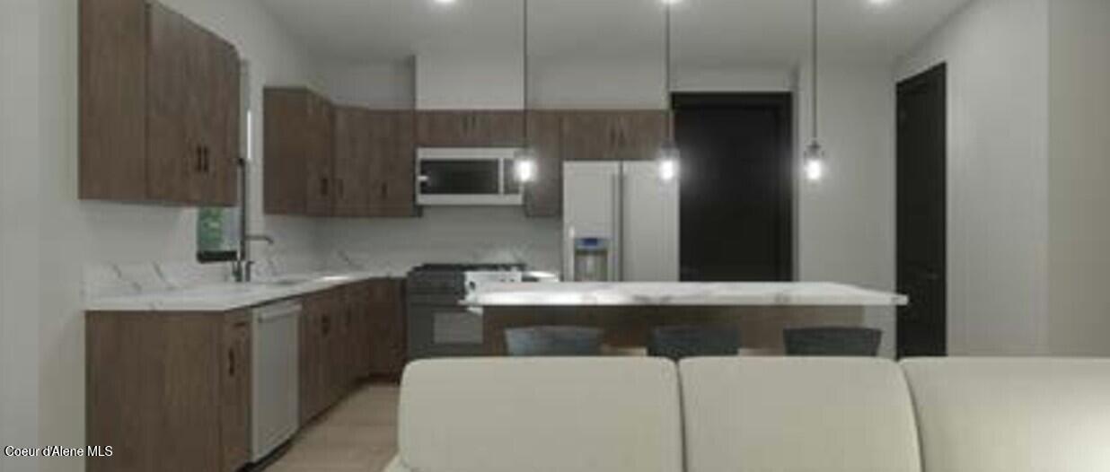11496 North Woolridge Way Rathdrum, ID 83858 - Photo 5 of 8 Juneau kitchen render