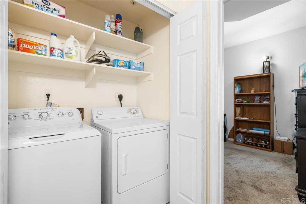 2715 Lake Pointe Drive, Unit 116 Spring Valley, CA 91977 - Photo 11 of 23 a utility room with dryer and washer