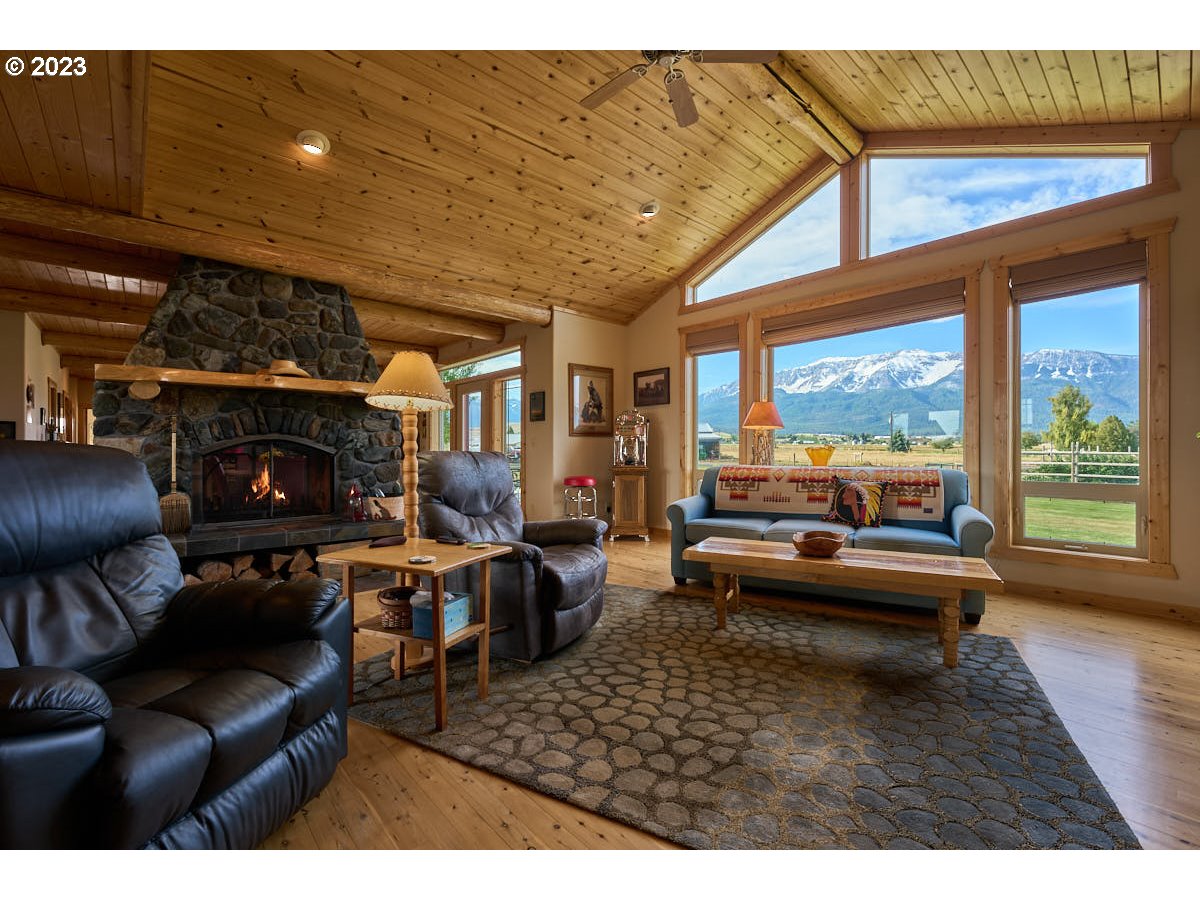 80117 Valley View Road Joseph, OR 97846 - Photo 5 of 38 a living room with furniture and a fireplace