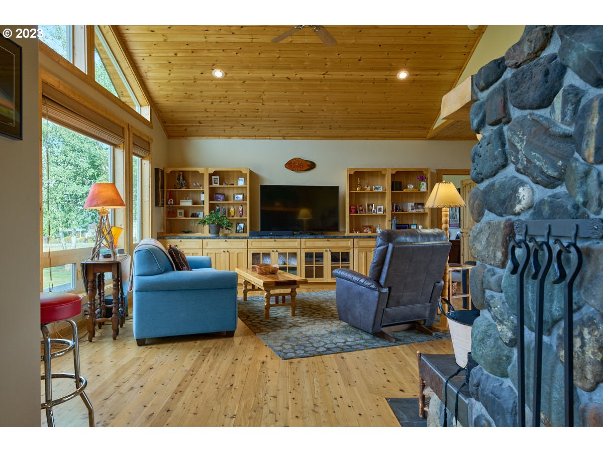 80117 Valley View Road Joseph, OR 97846 - Photo 8 of 38 a living room with furniture and a flat screen tv