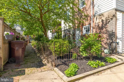 a view of a backyard of the house