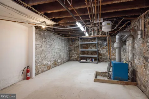 a view of storage and utility room