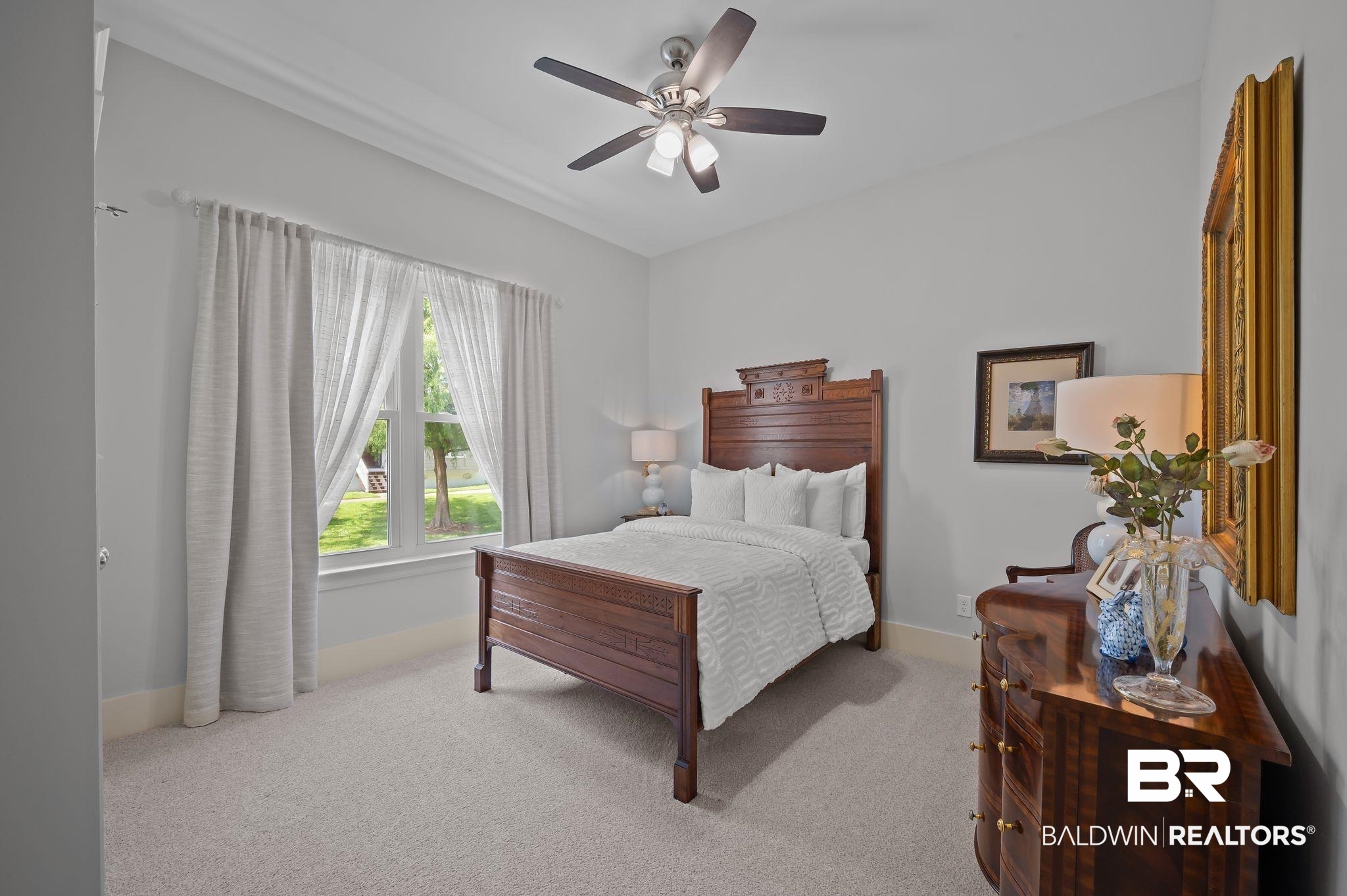 905 Buttercup Lane Foley, AL 36535 - Photo 32 of 47 Carpeted bedroom with baseboards and ceiling fan
