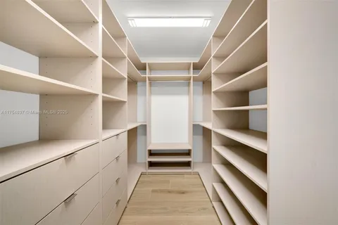 a view of a hallway with staircase