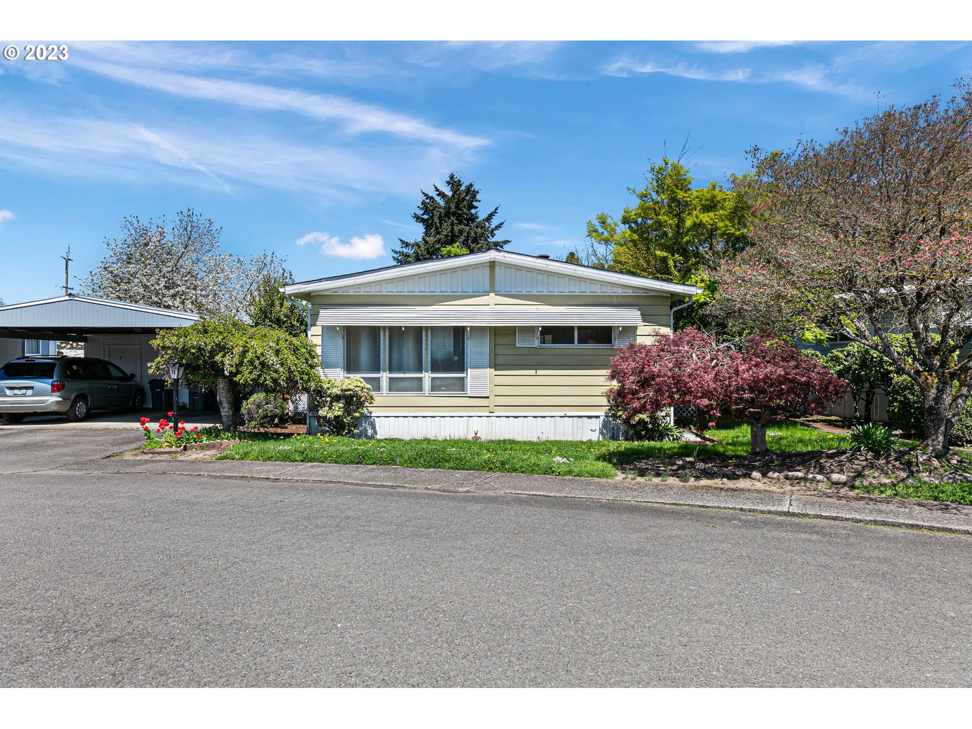 3530 East Game Farm Road Springfield, OR 97477 - Photo 1 of 38 a front view of house with yard and green space