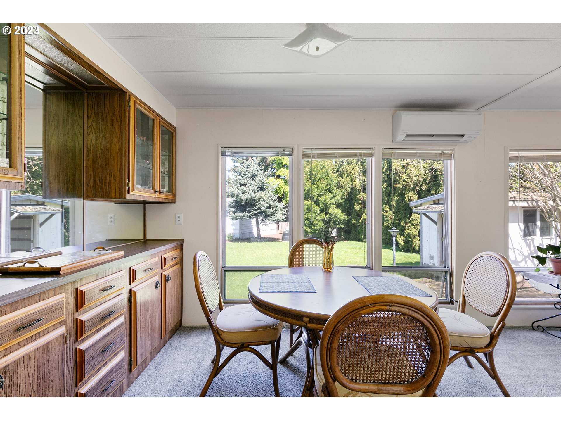 3530 East Game Farm Road Springfield, OR 97477 - Photo 12 of 38 a kitchen with a table chairs and a stove