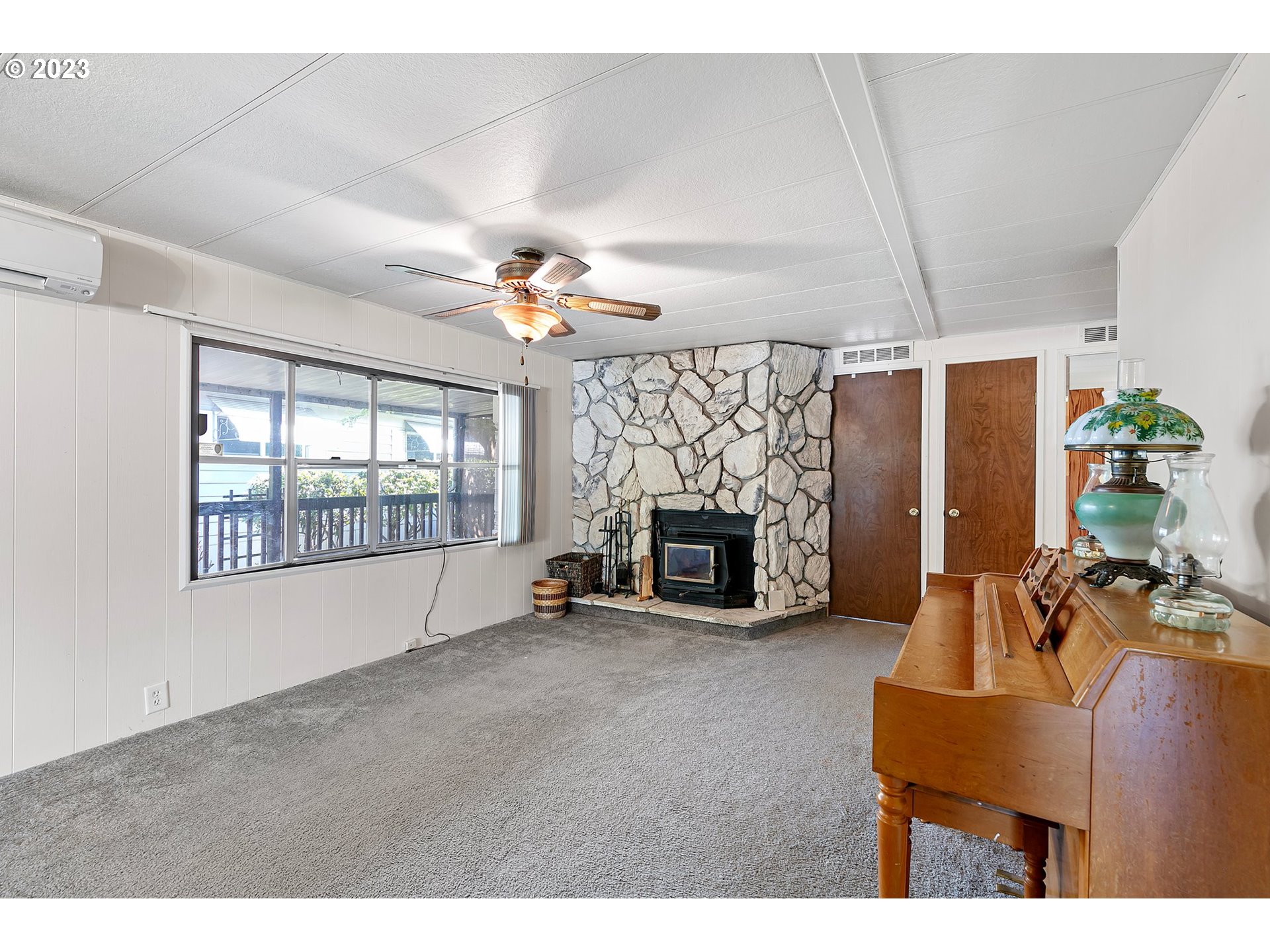 3530 East Game Farm Road Springfield, OR 97477 - Photo 13 of 38 a living room with furniture and a fireplace