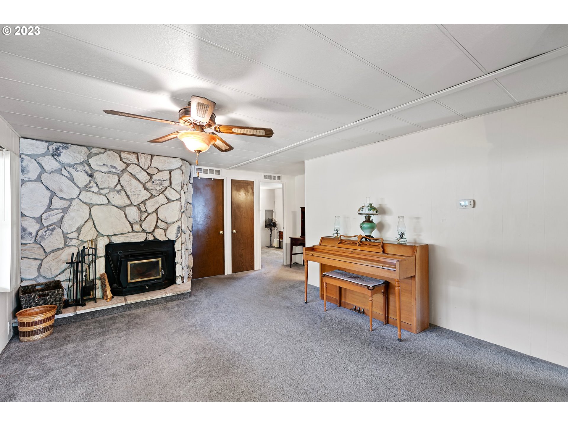 3530 East Game Farm Road Springfield, OR 97477 - Photo 15 of 38 a living room with furniture and a fireplace