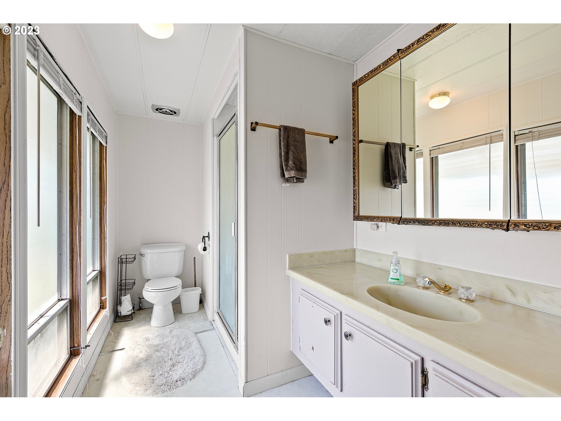 3530 East Game Farm Road Springfield, OR 97477 - Photo 19 of 38 a bathroom with a sink double vanity and a toilet