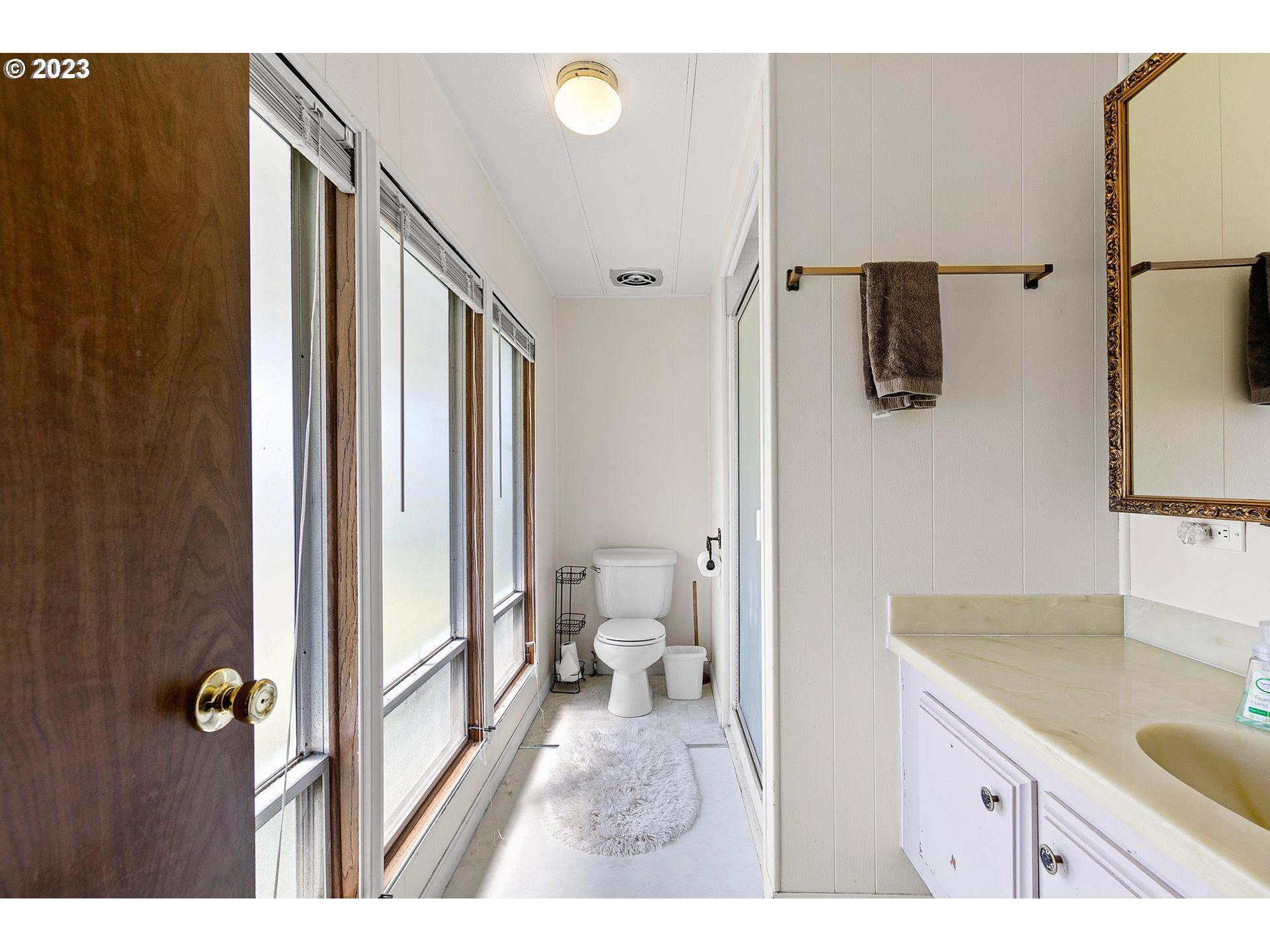 3530 East Game Farm Road Springfield, OR 97477 - Photo 20 of 38 a bathroom with a granite countertop sink toilet and shower