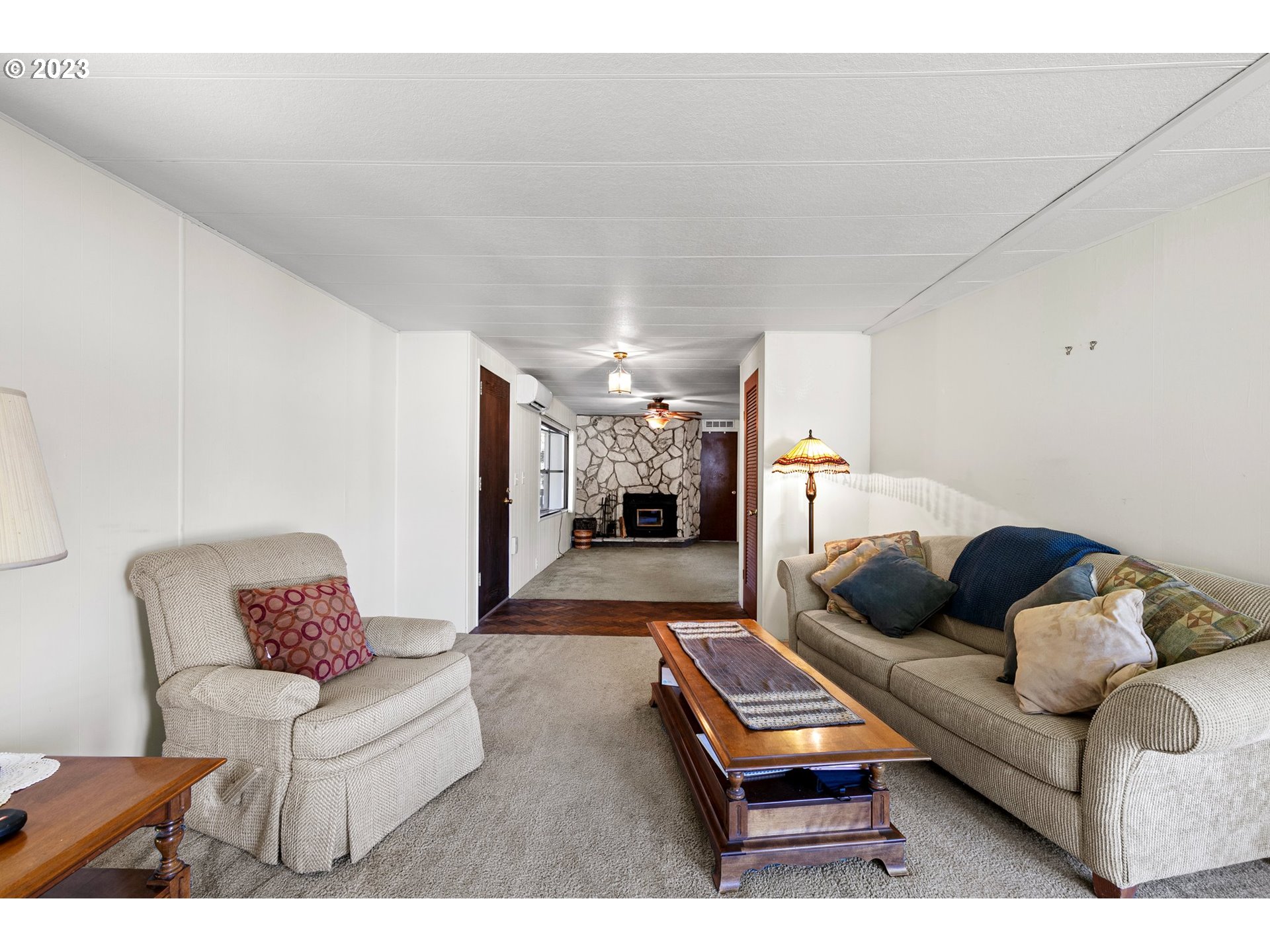 3530 East Game Farm Road Springfield, OR 97477 - Photo 10 of 38 a living room with furniture and a couch
