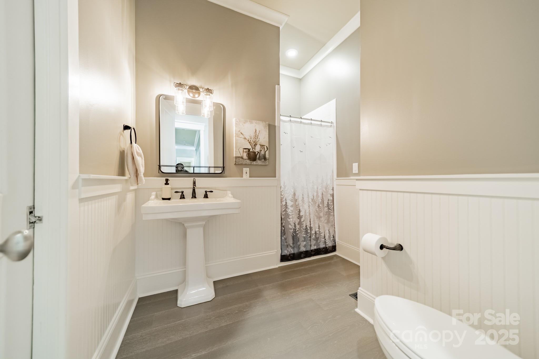 1946 Brawley School Road Mooresville, NC 28117 - Photo 22 of 48 a bathroom with a sink mirror and toilet