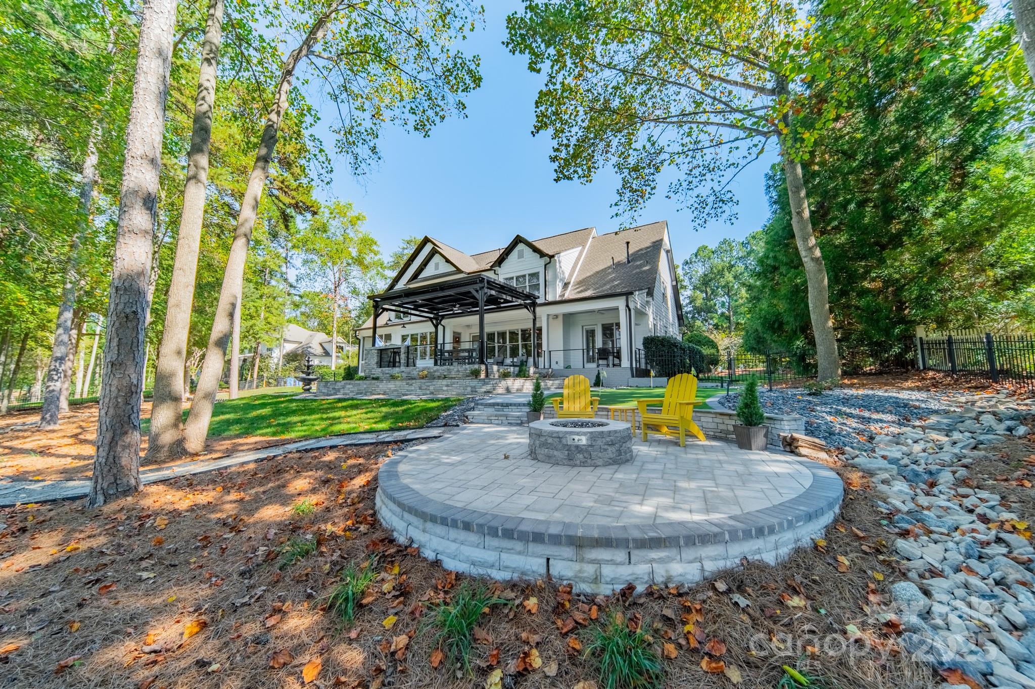 1946 Brawley School Road Mooresville, NC 28117 - Photo 6 of 48 a view of a house with swimming pool and sitting area
